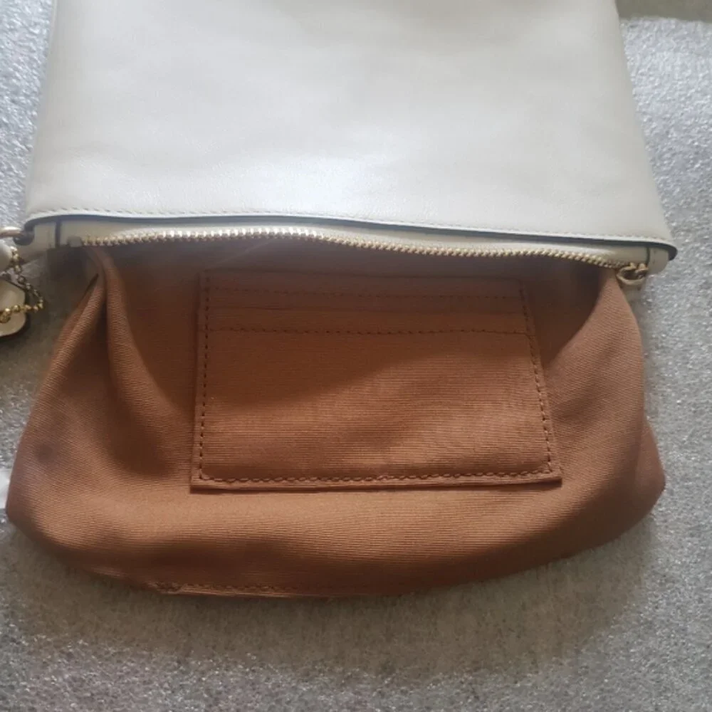 Coach White Leather Wristlet with Cut Out Tea Rose